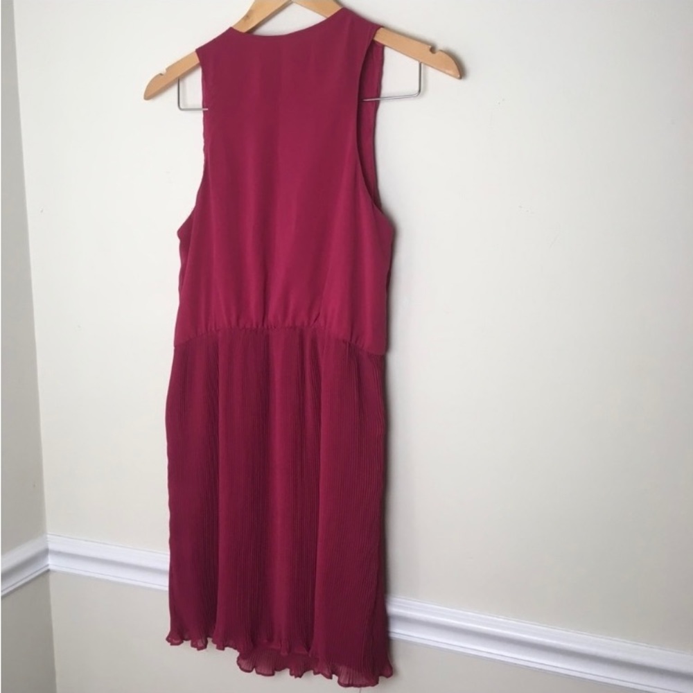 Size small 
Fully lined 
Length 35 inches 
Bust armpit to armpit 34 inches